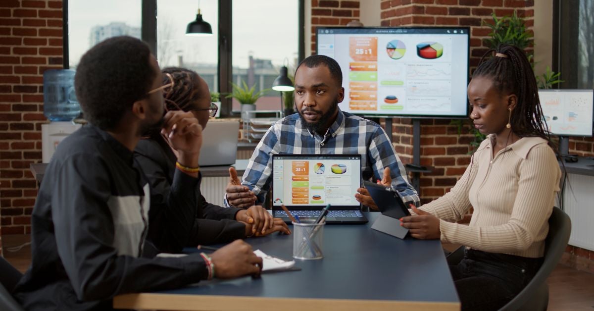 People working around a conference table