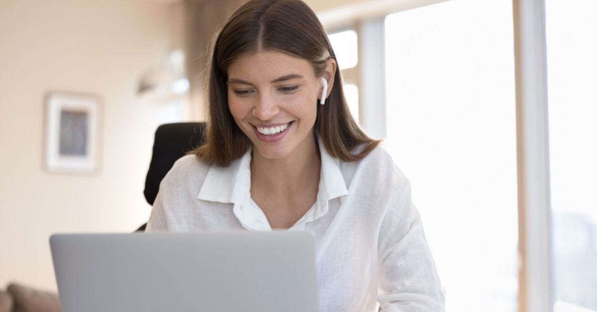 Women reading something on a laptop