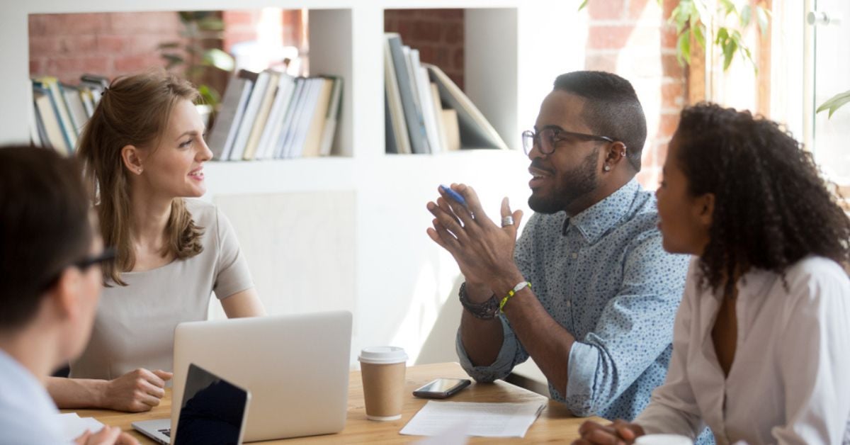 People collaborating in discussion