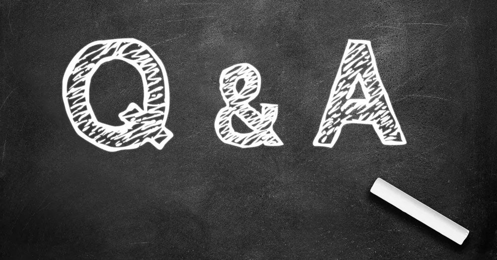 Chalk illustration that says "Q & A"