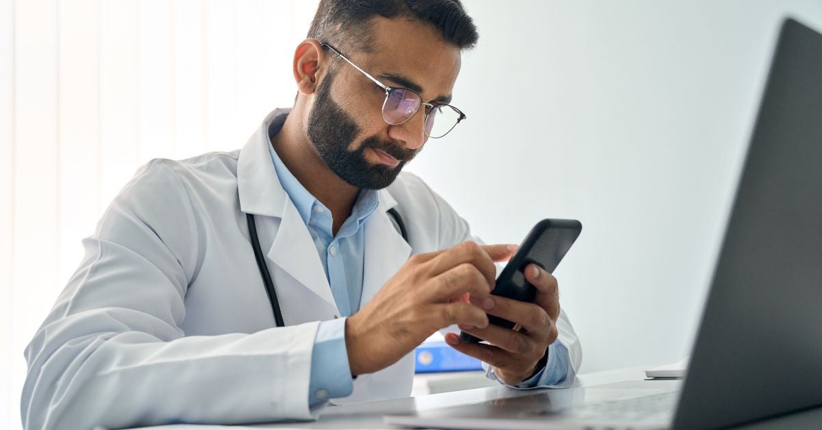 Man reading on a phone