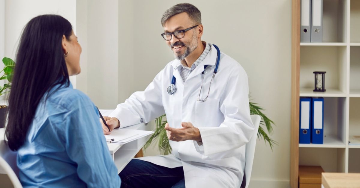 Medical professional talking to a patient