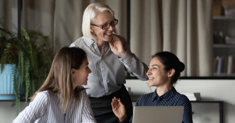 Three happy woman talkling