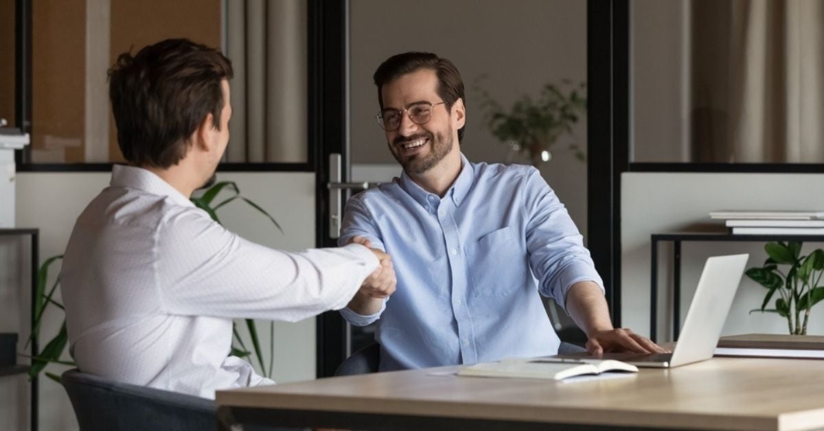 Two people shaking hands