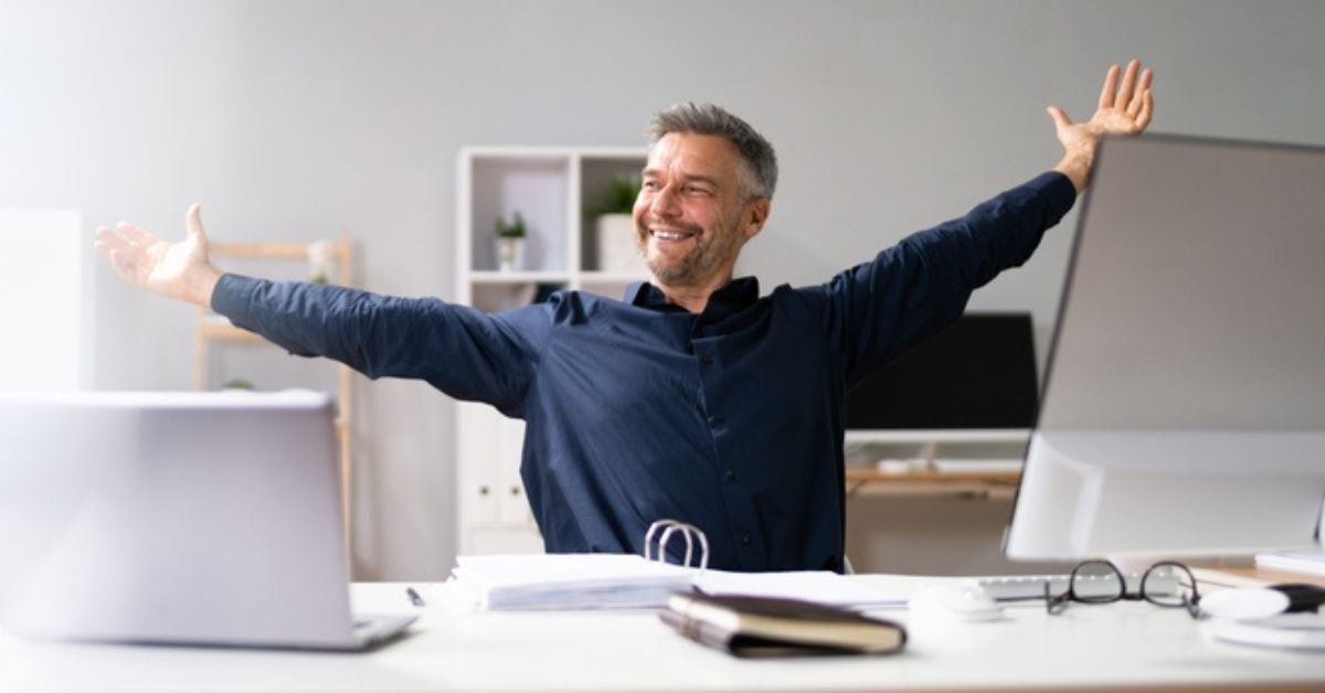 Happy man stretching out both arms