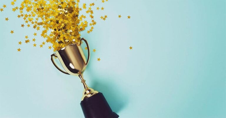 Stars spraying out the top of a trophy