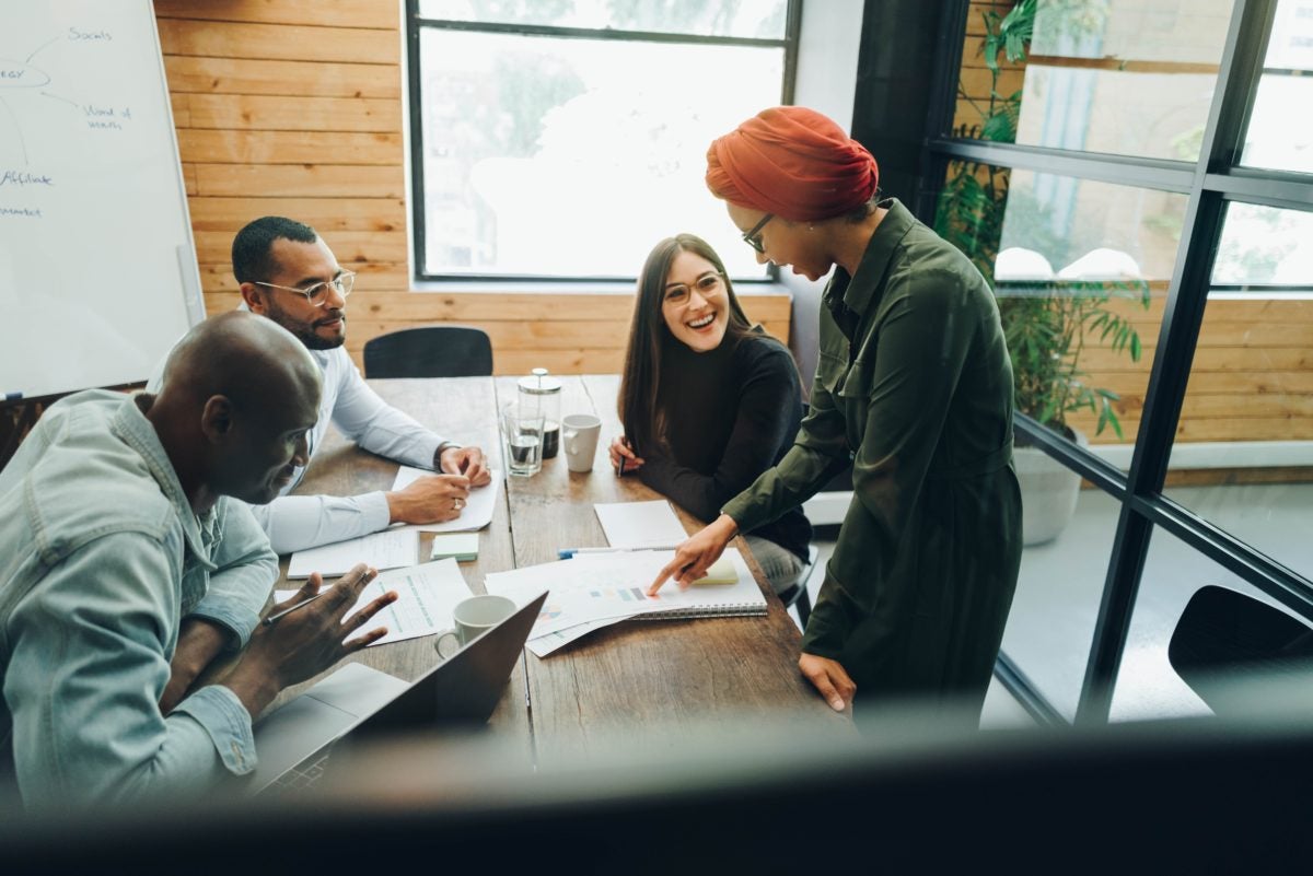 diverse-employees-in-conference-room