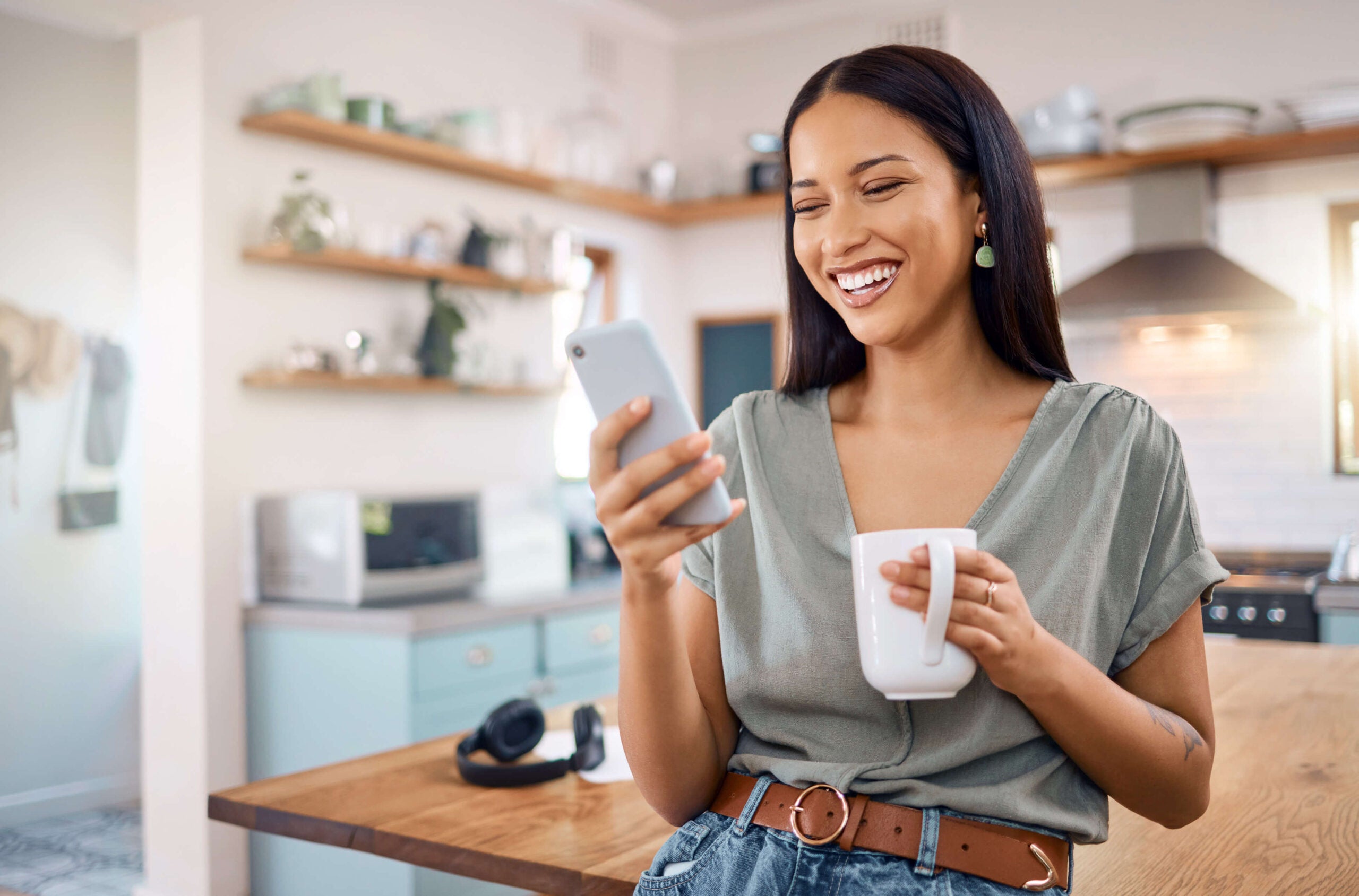 diverse woman checks text messages