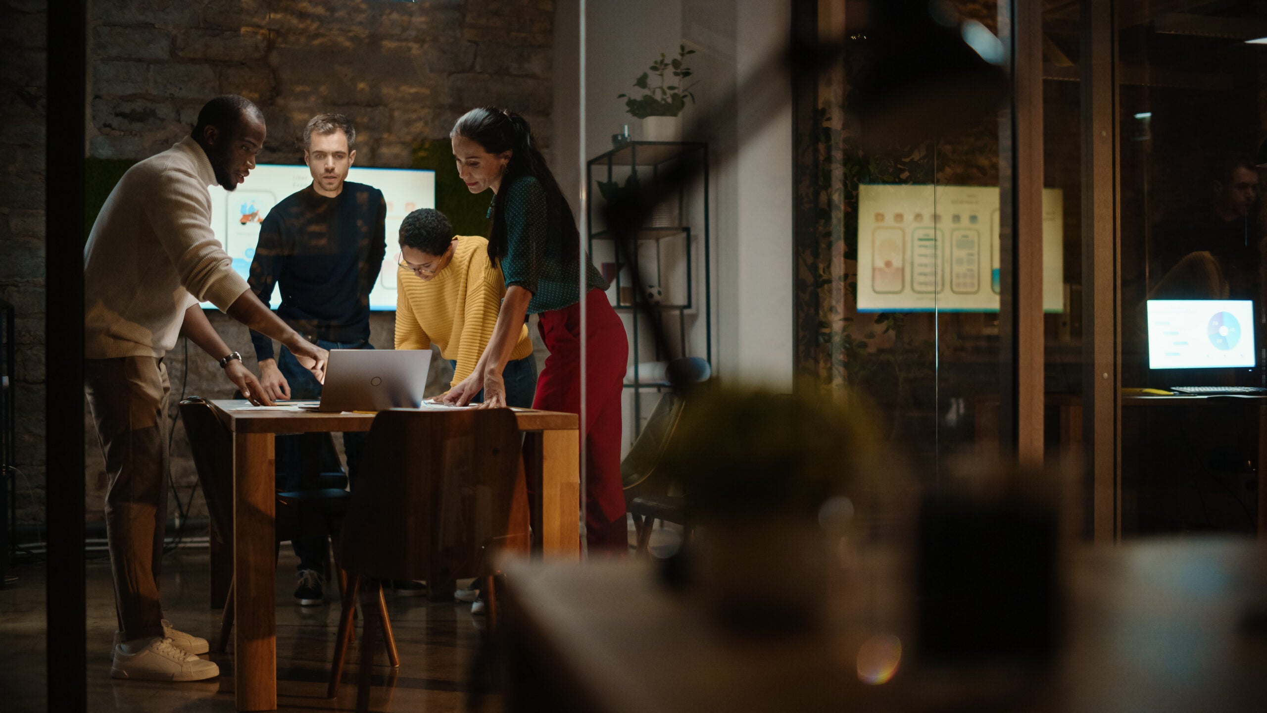 Group of team members planning at an office table